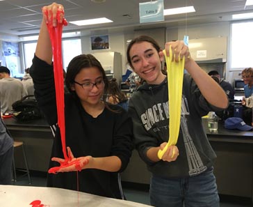 Students making slime for Halloween.